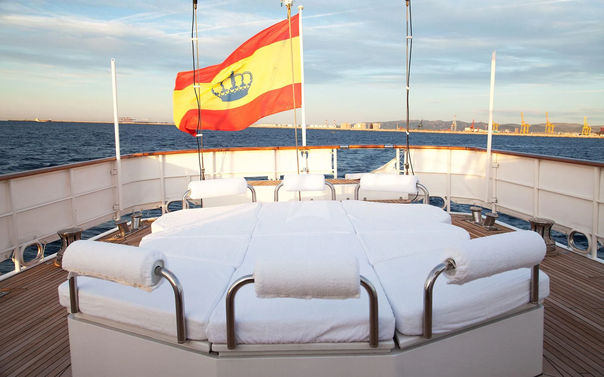 a boat with a flag on it aboard MATA MUA Yacht for Sale