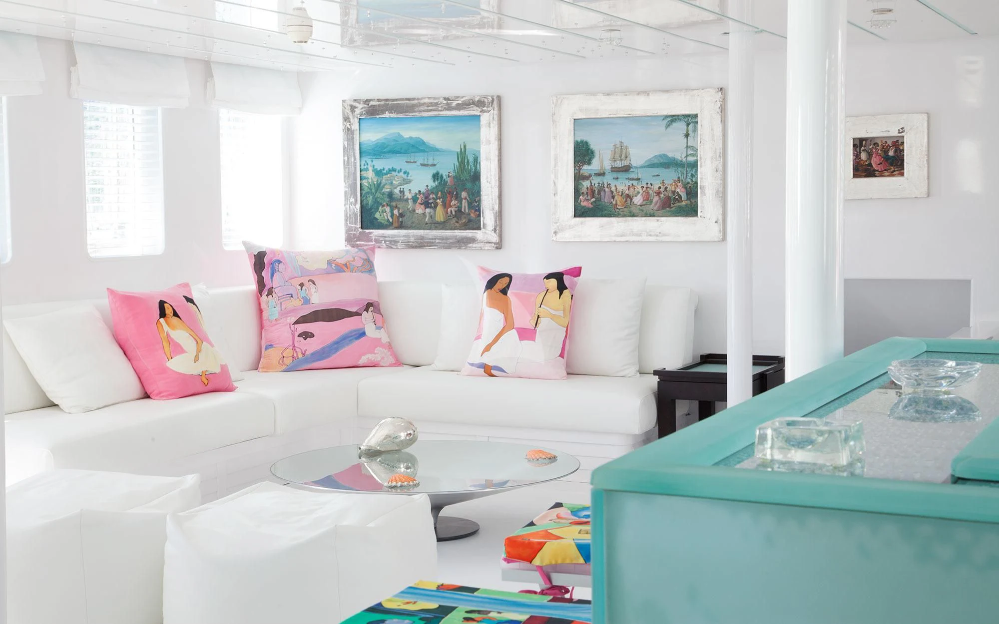a living room with a white couch aboard MATA MUA Yacht for Sale