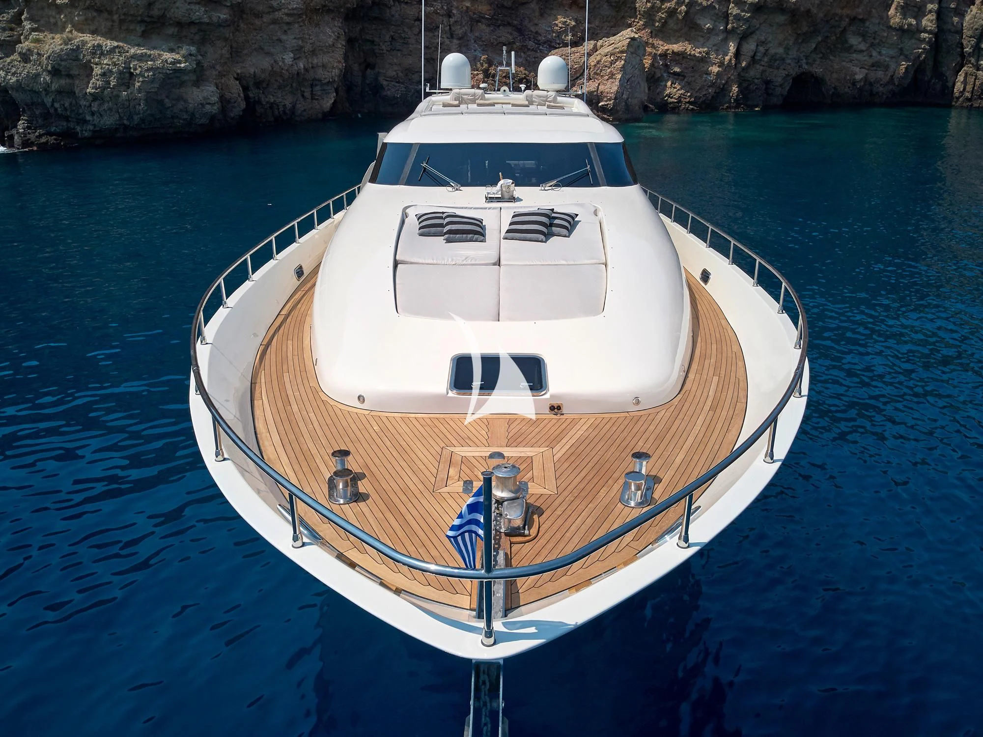 a white boat in the water aboard RUBY Yacht for Charter