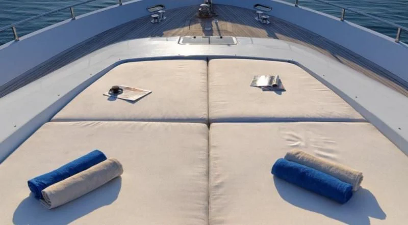 a wooden board with a screwdriver and a screwdriver aboard RUBY Yacht for Charter