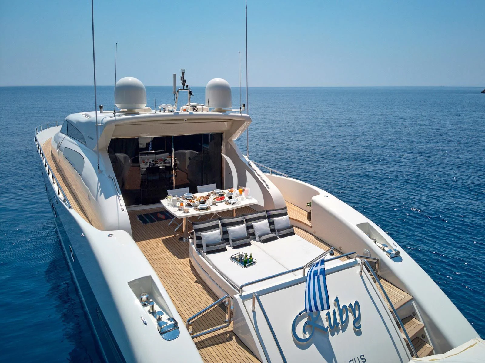 a boat with a grill on the deck aboard RUBY Yacht for Charter