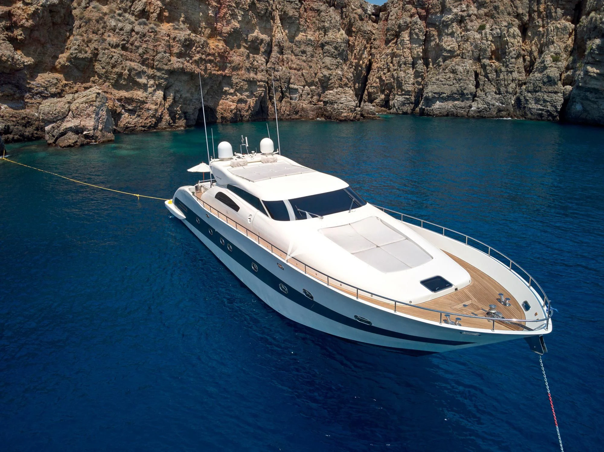 a white boat in the water aboard RUBY Yacht for Charter