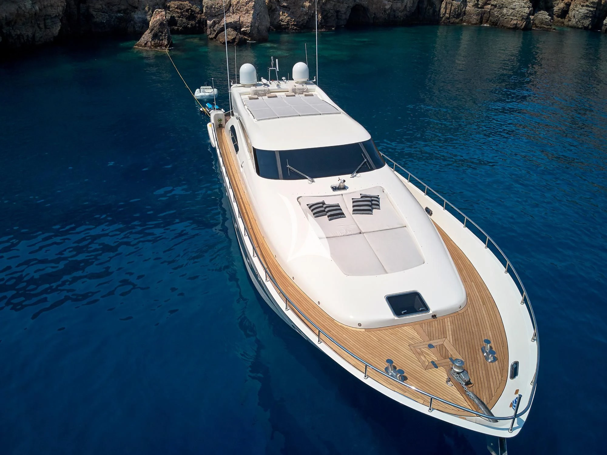 a white boat in the water aboard RUBY Yacht for Charter