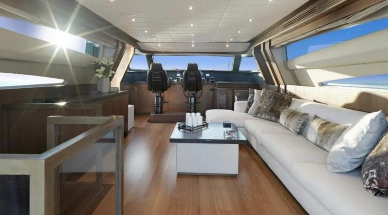 a room with a couch and a table aboard RUBY Yacht for Charter