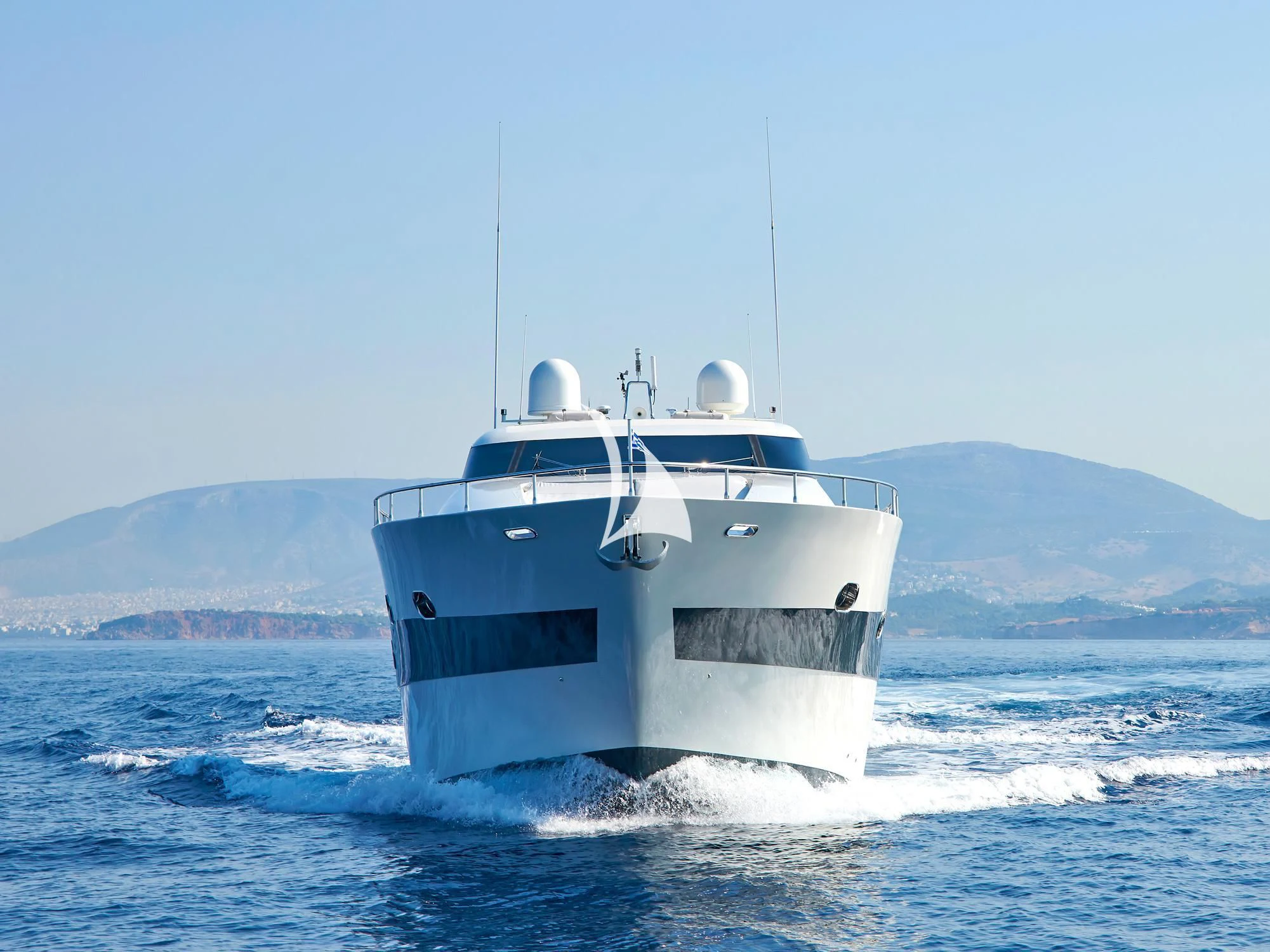 a white boat in the water aboard RUBY Yacht for Charter