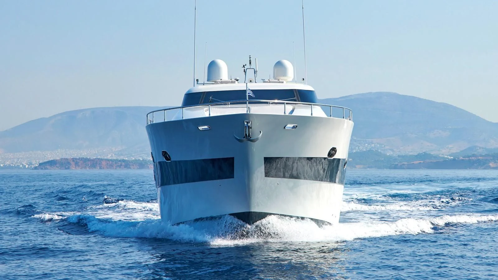 a white boat in the water aboard RUBY Yacht for Charter