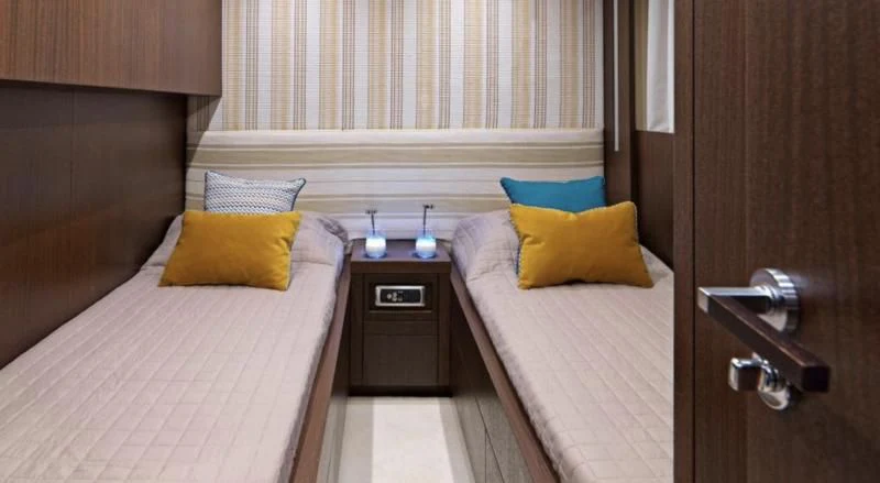 a room with two beds aboard RUBY Yacht for Charter