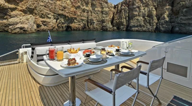 a table with food on it aboard RUBY Yacht for Charter