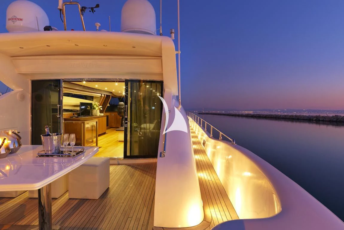a room with a table and chairs aboard RUBY Yacht for Charter