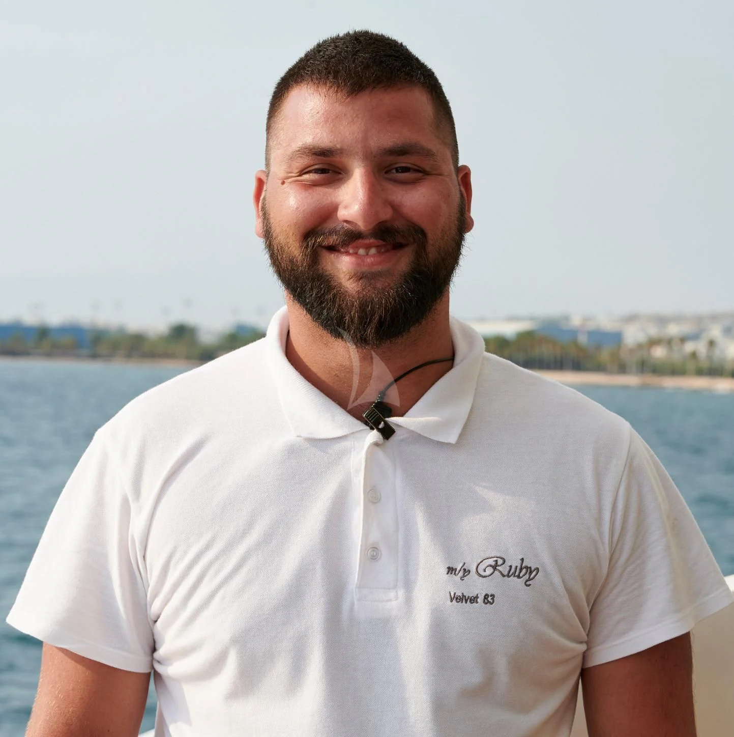 a man with a beard aboard RUBY Yacht for Charter