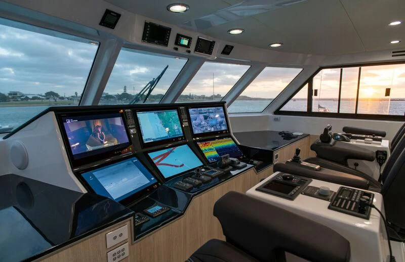 a control room with many monitors aboard LA BELLA CHERIE Yacht for Sale
