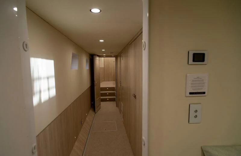 a hallway with a door and a hallway aboard LA BELLA CHERIE Yacht for Sale