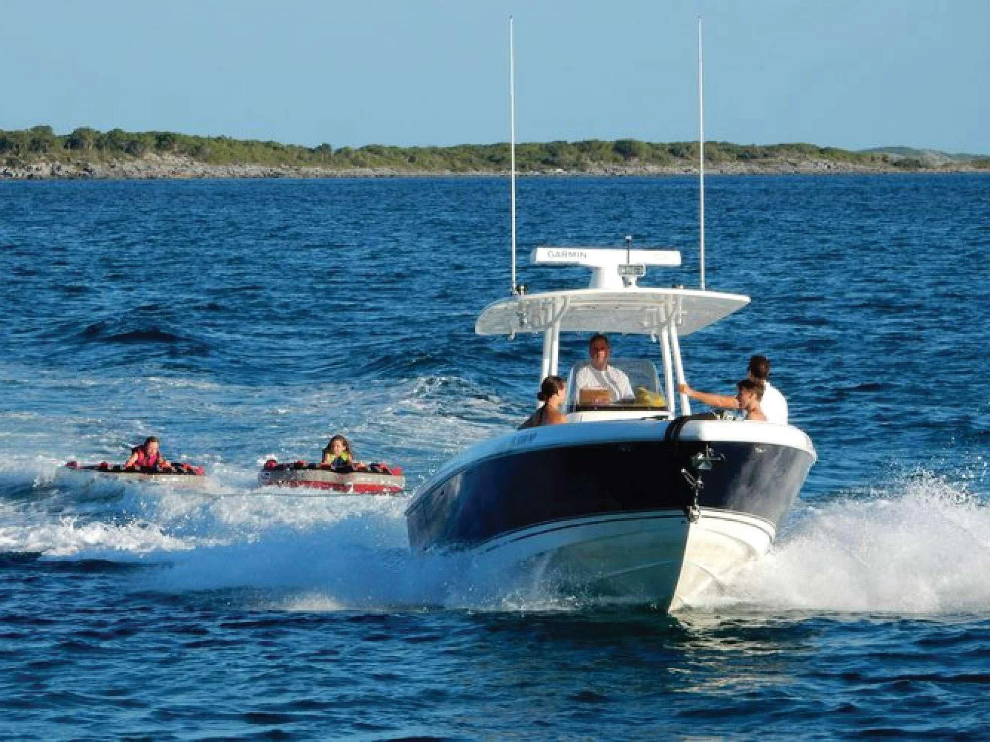 a group of people on a boat aboard OCTOPUSSY Yacht for Sale