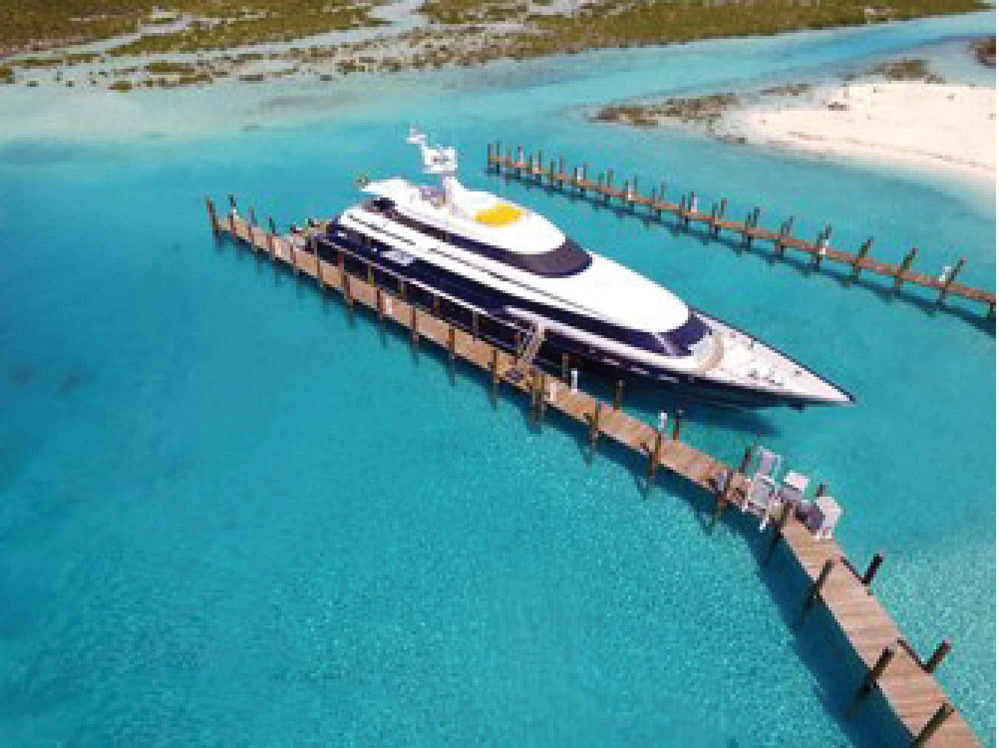 a large ship in the water aboard OCTOPUSSY Yacht for Sale