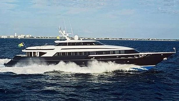 a large ship in the water aboard OCTOPUSSY Yacht for Sale