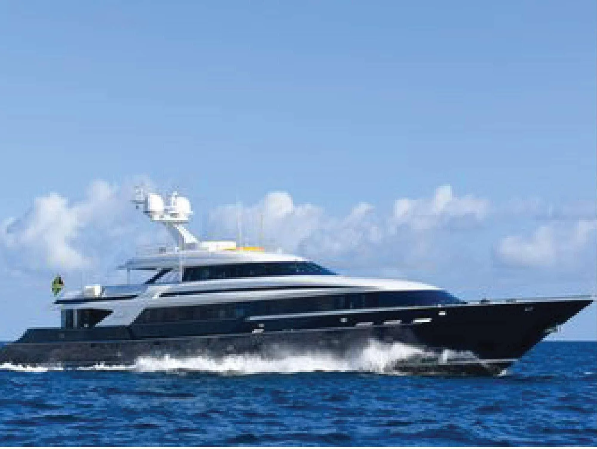 a large boat in the water aboard OCTOPUSSY Yacht for Sale