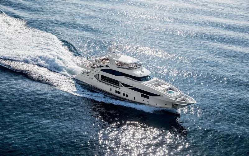a white yacht on the water aboard BAMBOO Yacht for Sale