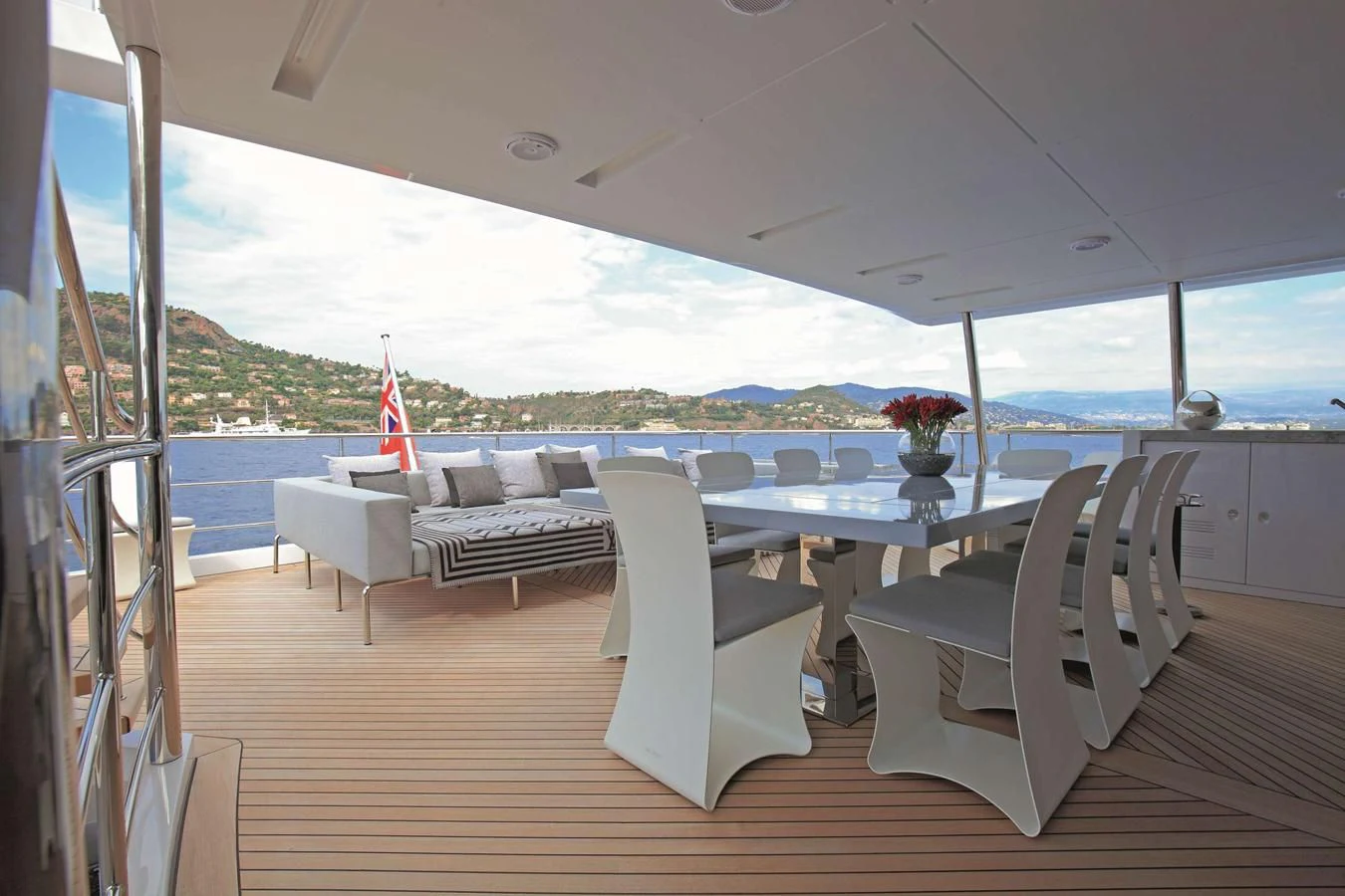 a room with a table and chairs aboard BAMBOO Yacht for Sale