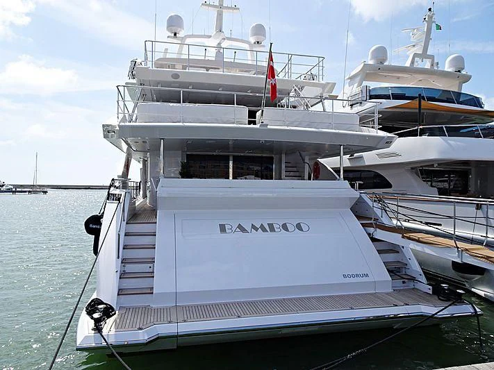 a large white boat on the water aboard BAMBOO Yacht for Sale