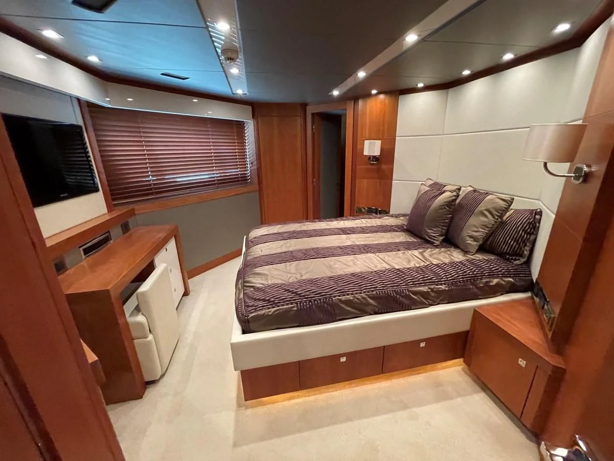 a bed in a room aboard HARBOUR Yacht for Sale