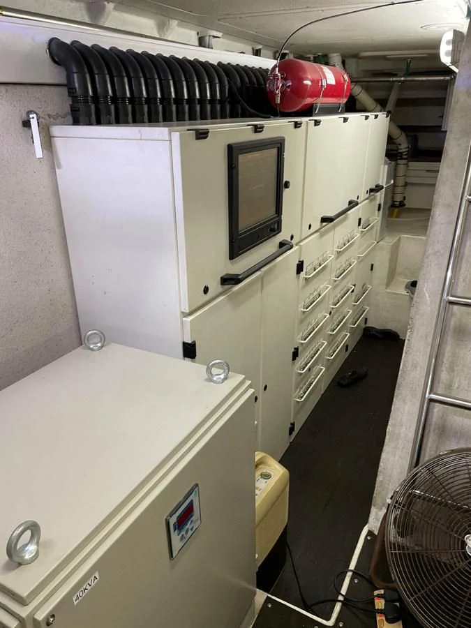 a machine with a red helmet on top aboard HARBOUR Yacht for Sale