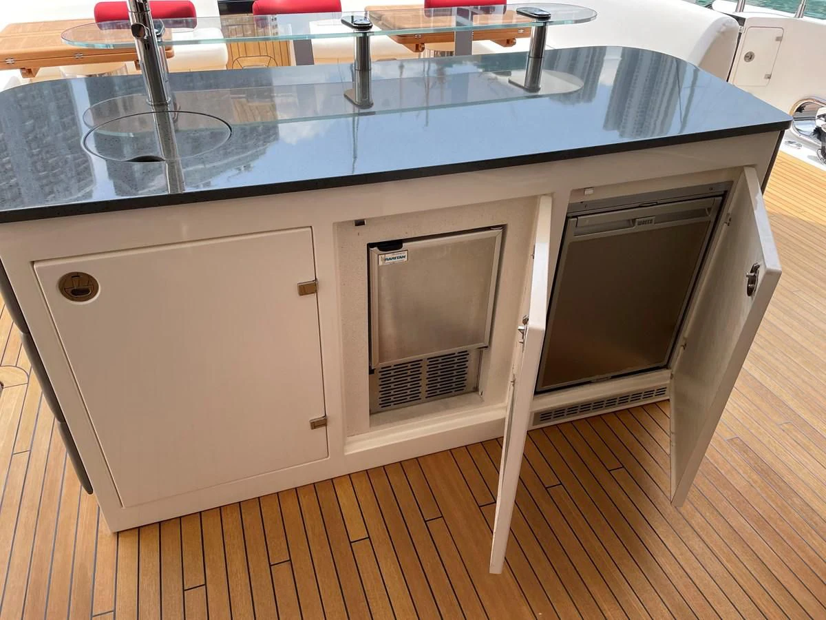 a kitchen with a large island aboard HARBOUR Yacht for Sale