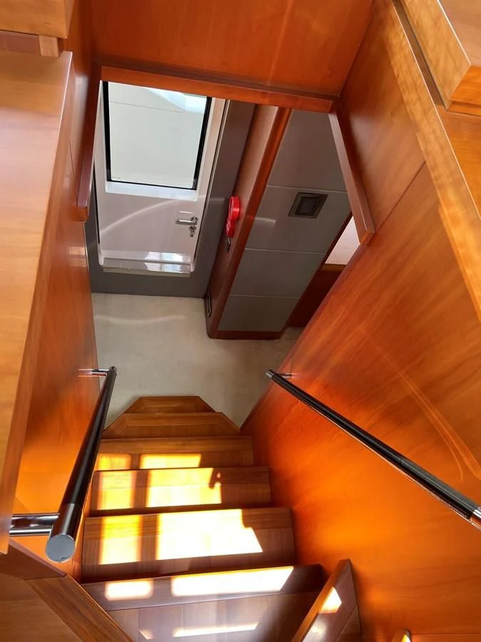a view of a staircase and a window aboard HARBOUR Yacht for Sale