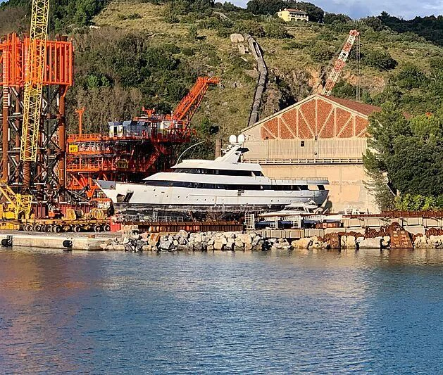 a large ship docked at a port aboard YOPUR Yacht for Sale