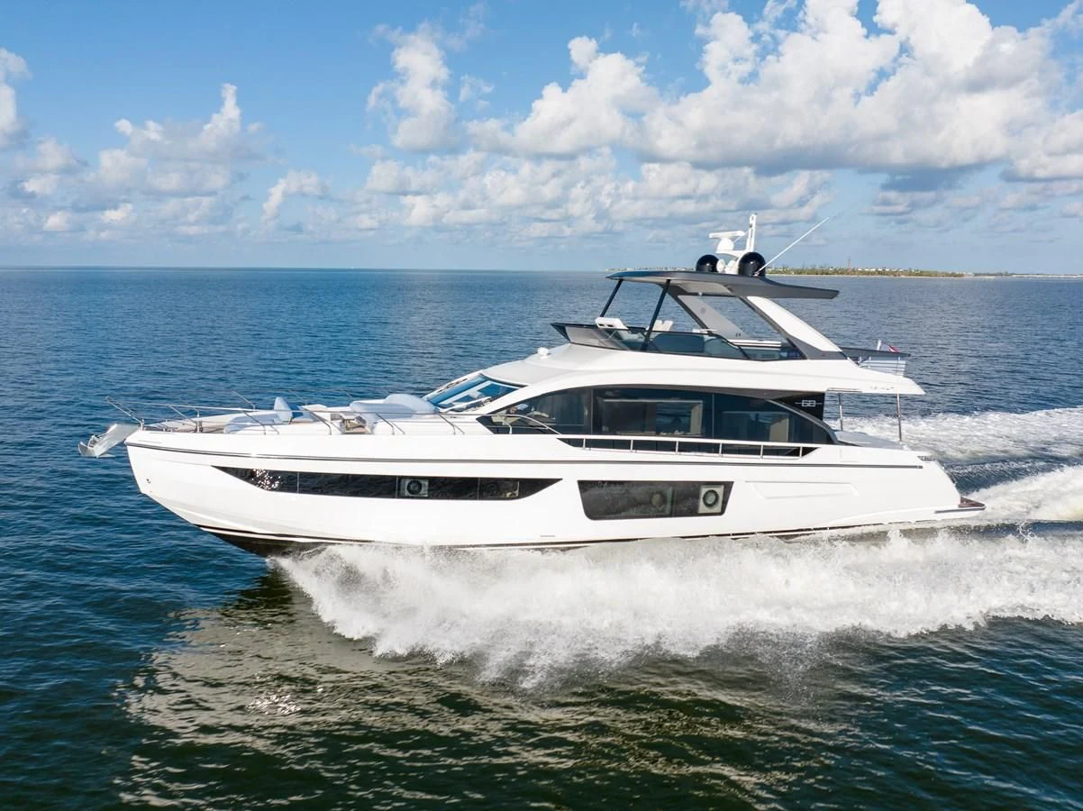 a white yacht on the water aboard 2023 AZIMUT FLY 78/56 Yacht for Sale