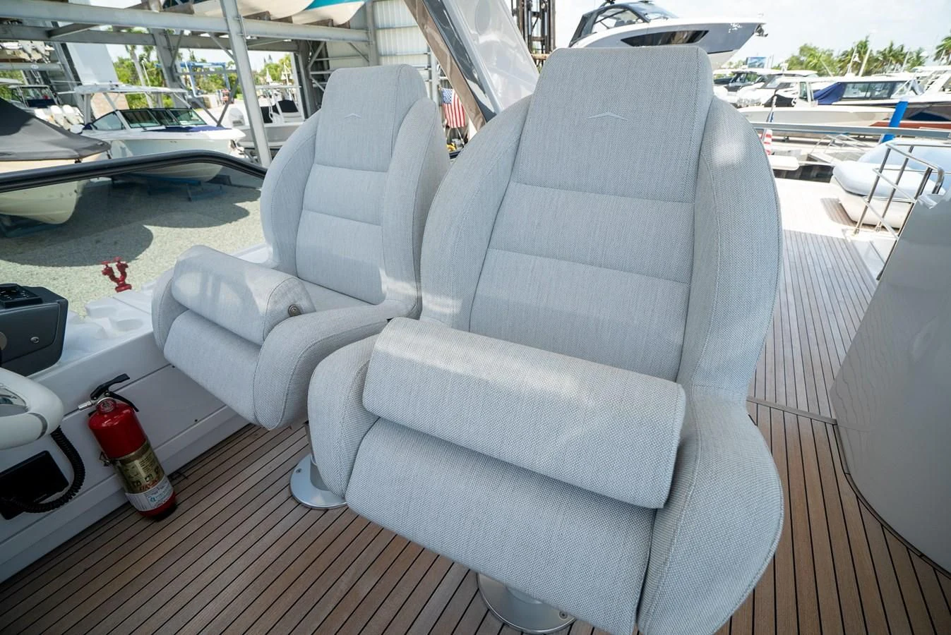 a white couch on a deck aboard 2023 AZIMUT FLY 78/56 Yacht for Sale