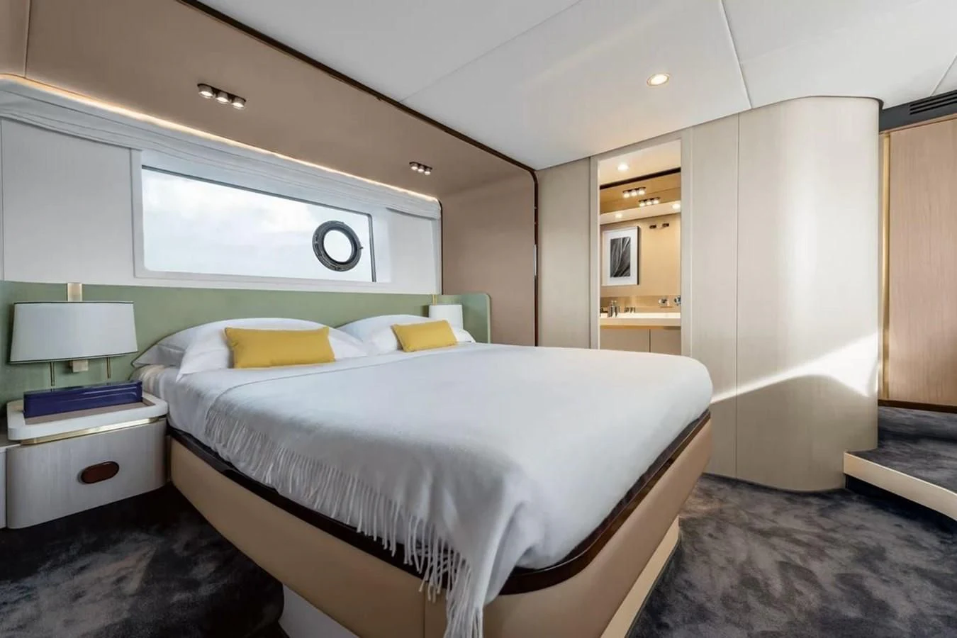 a bedroom with a bed and a desk aboard 2023 AZIMUT FLY 78/56 Yacht for Sale