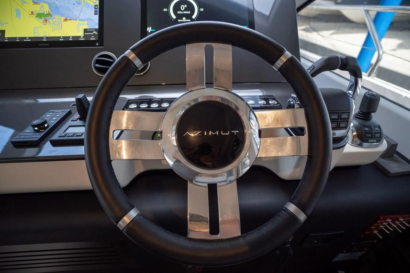 a close-up of a steering wheel aboard 2023 AZIMUT FLY 78/56 Yacht for Sale