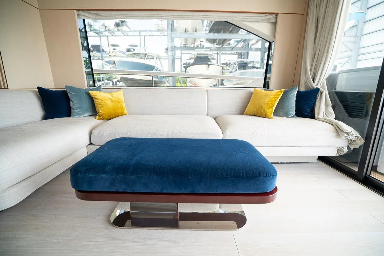 a couch with pillows aboard 2023 AZIMUT FLY 78/56 Yacht for Sale