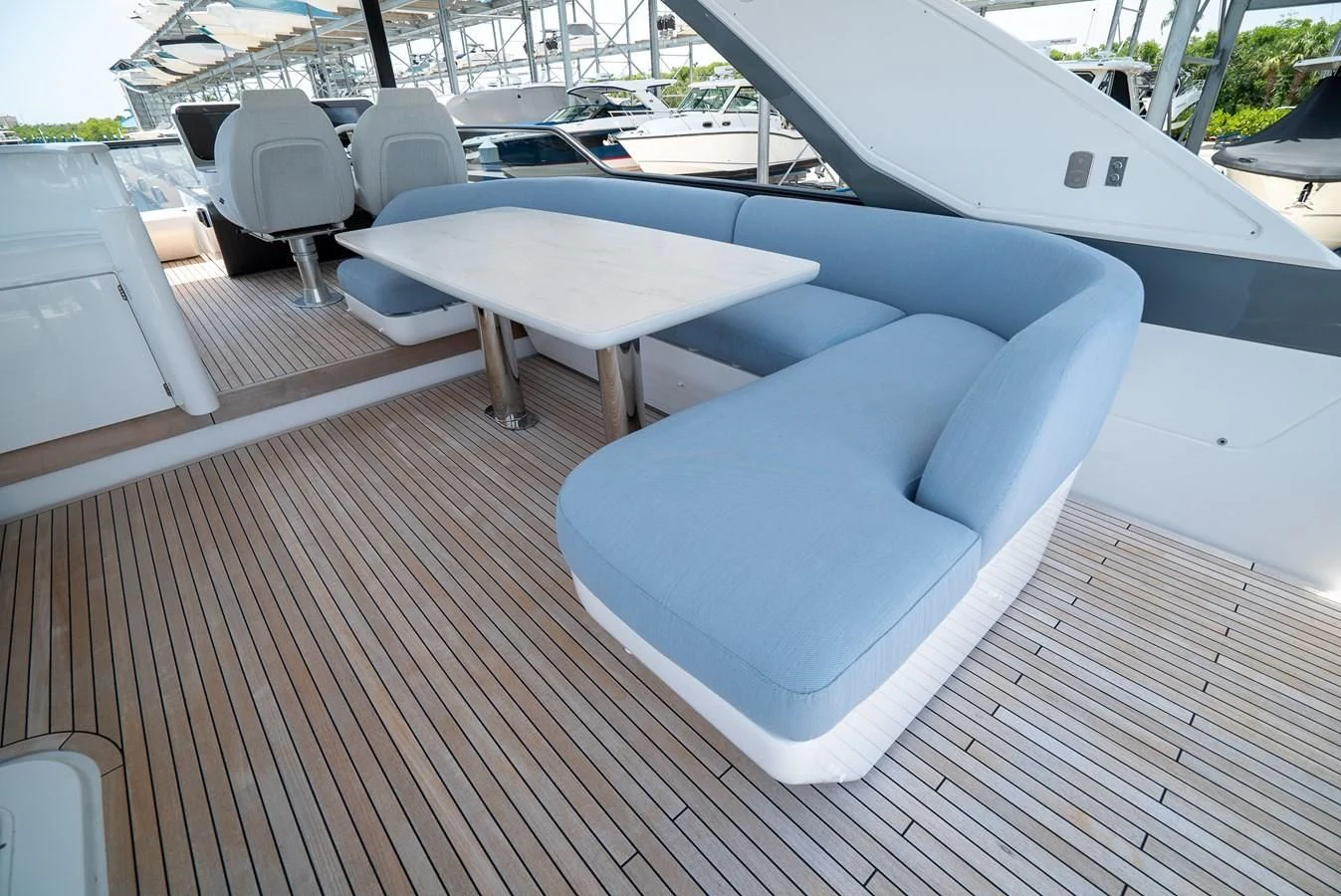 a group of chairs on a deck aboard 2023 AZIMUT FLY 78/56 Yacht for Sale