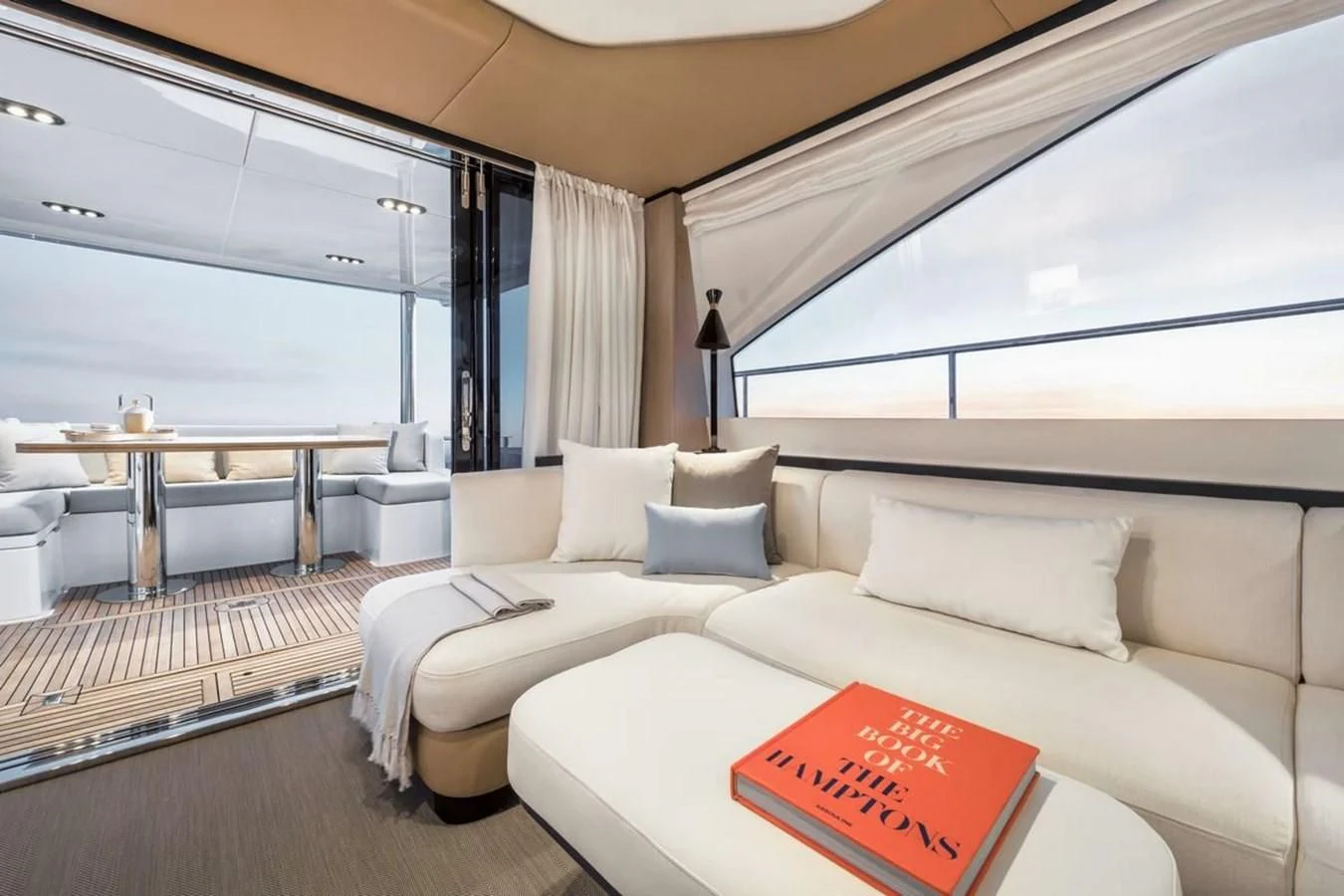 a room with a bed and a table aboard 2023 AZIMUT FLY 78/56 Yacht for Sale