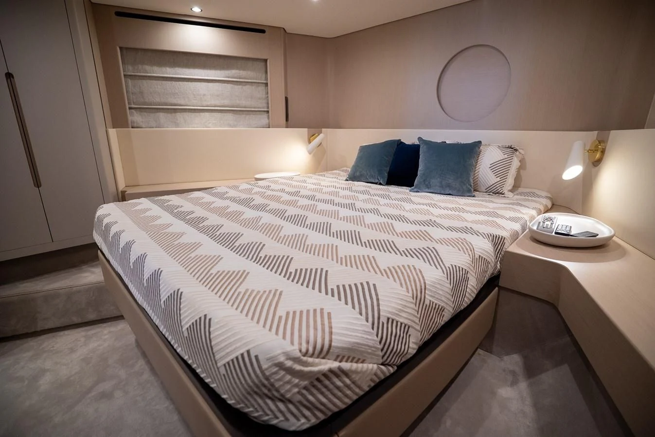 a bed with a white comforter aboard 2023 AZIMUT FLY 78/56 Yacht for Sale