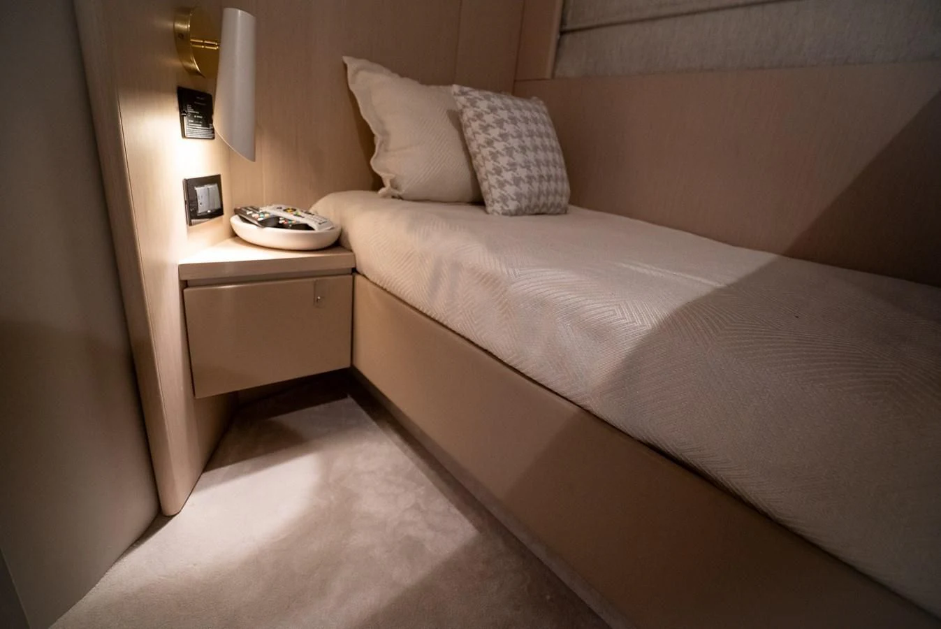 a bed with a white comforter aboard 2023 AZIMUT FLY 78/56 Yacht for Sale