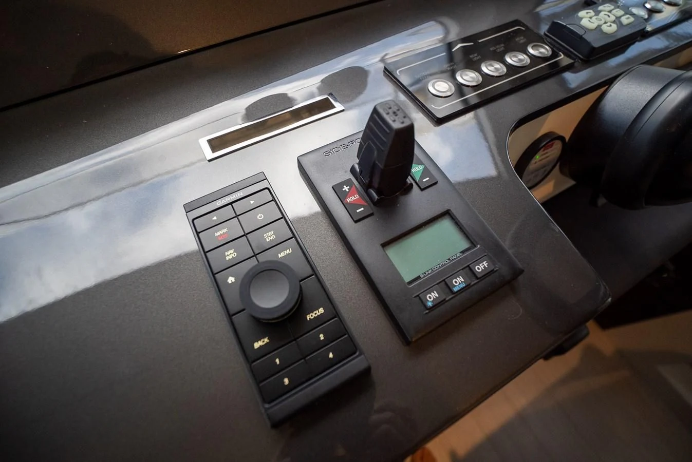 a group of cell phones on a table aboard 2023 AZIMUT FLY 78/56 Yacht for Sale