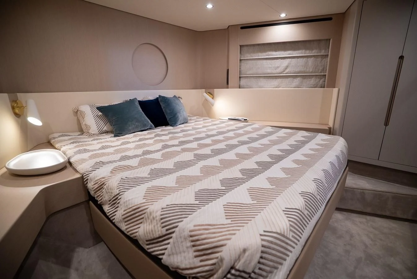 a bed with a white comforter aboard 2023 AZIMUT FLY 78/56 Yacht for Sale