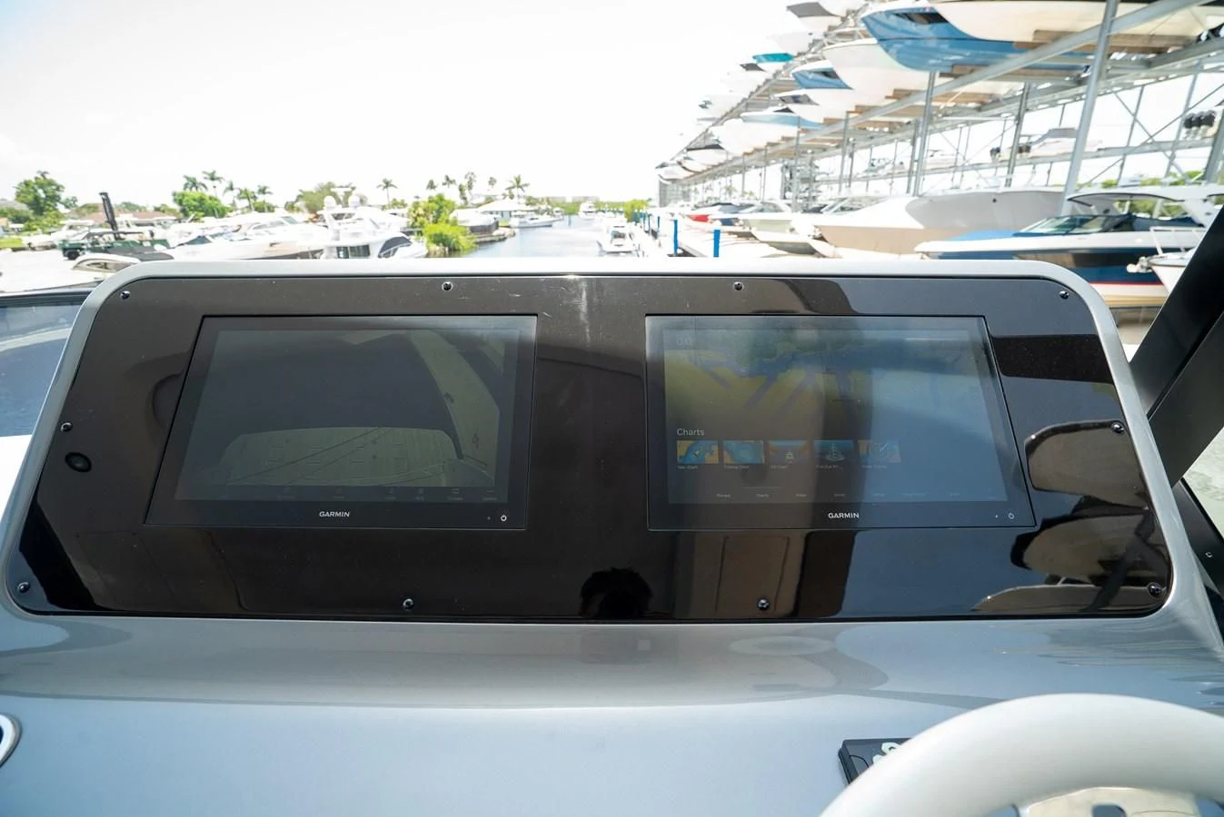 a car with a screen on the window aboard 2023 AZIMUT FLY 78/56 Yacht for Sale