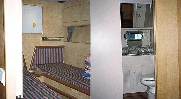 a bathroom with a sink and a bed aboard ABOU MAYA Yacht for Sale