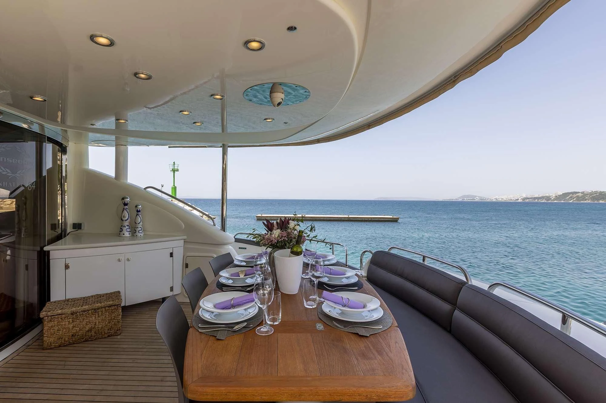 a dining table on a boat aboard SKYWATER Yacht for Sale