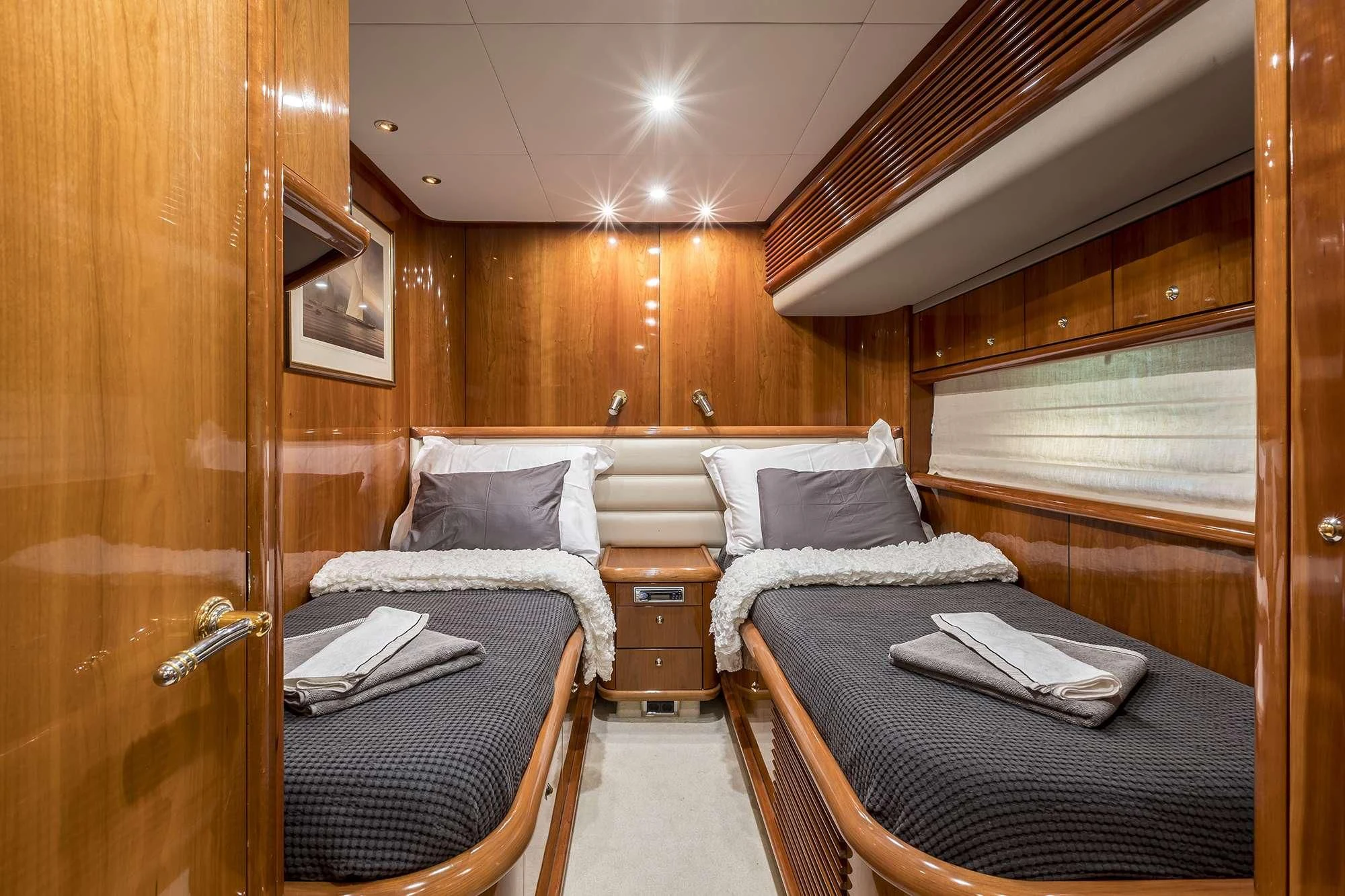 a couple of beds in a cabin aboard SKYWATER Yacht for Sale