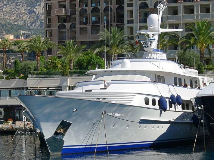 a large white boat docked aboard LADY GEORGINA Yacht for Sale
