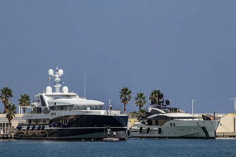 a couple of large boats in the water aboard BLISS Yacht for Sale