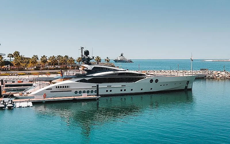 a large white boat in the water aboard BLISS Yacht for Sale
