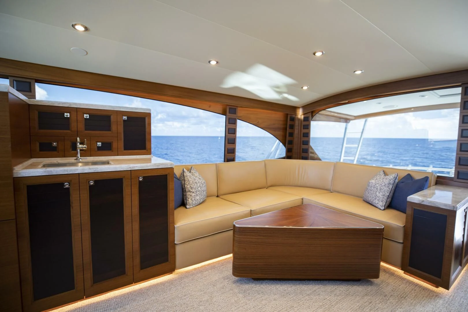 a living room with a large window aboard III AMIGOS Yacht for Sale