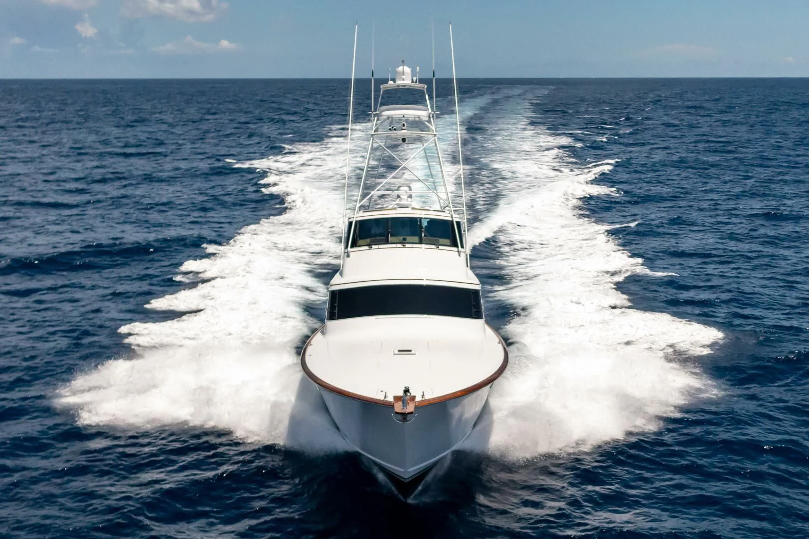 a boat on the water aboard III AMIGOS Yacht for Sale