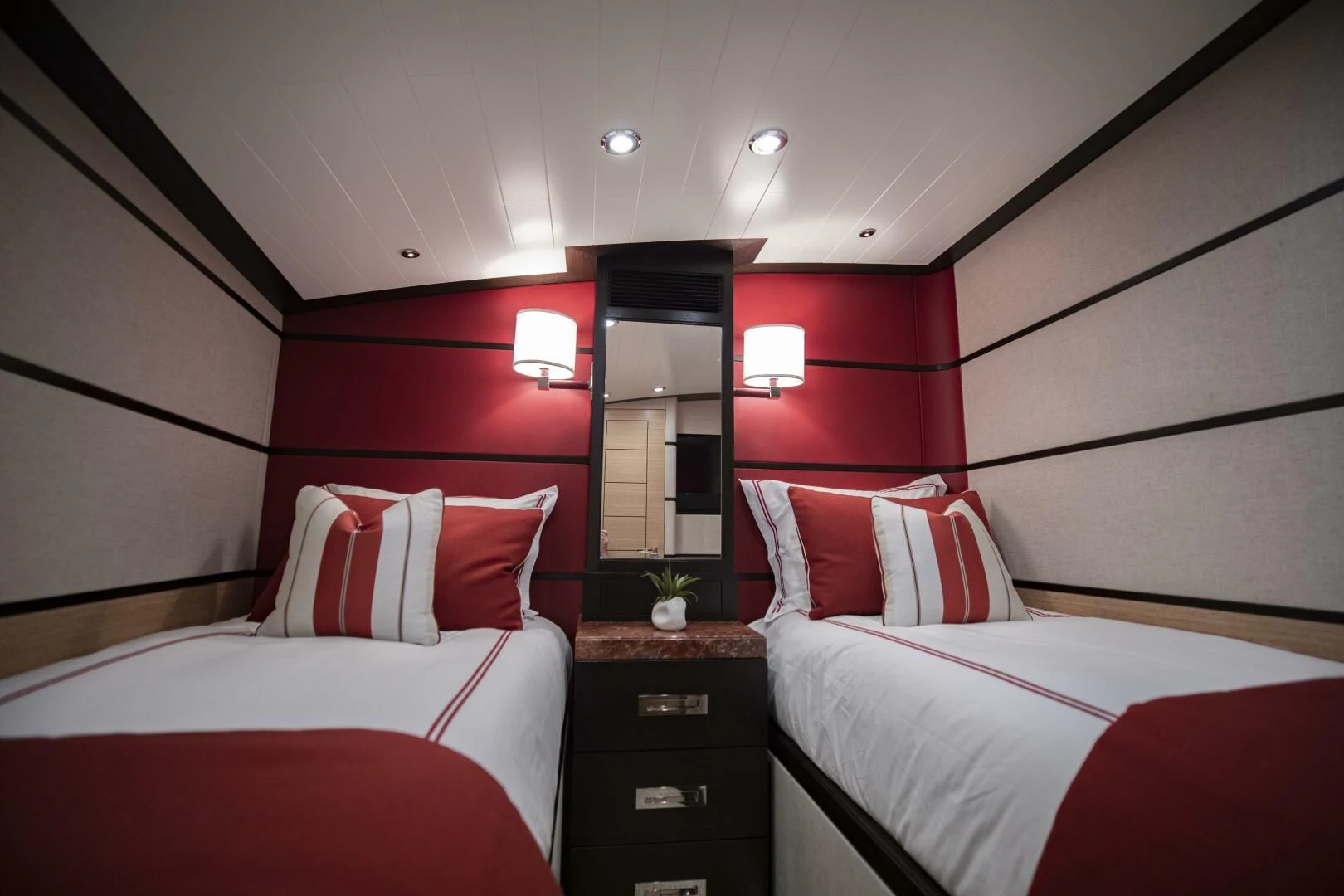 a couple of beds in a room aboard III AMIGOS Yacht for Sale