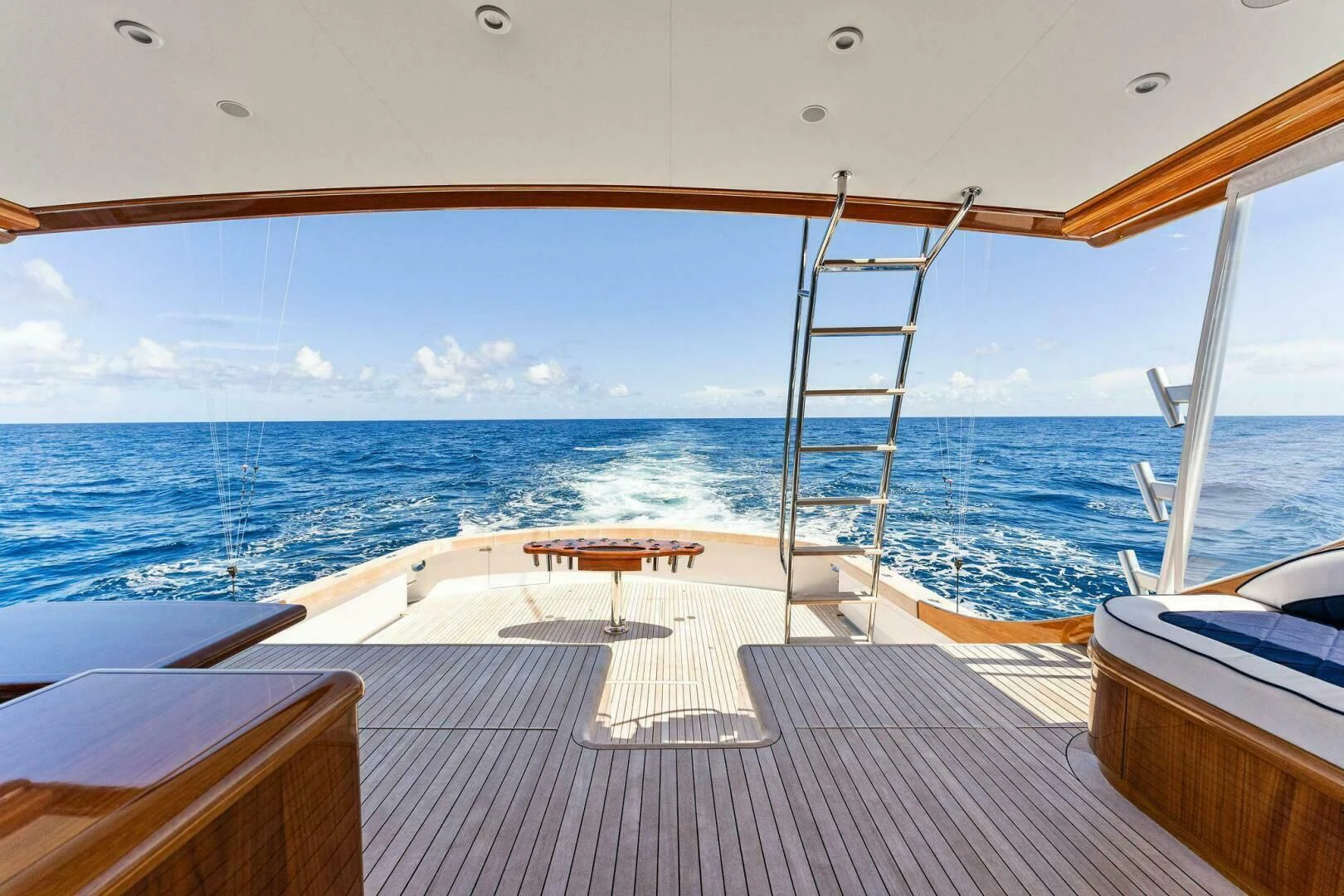 a deck overlooking the ocean aboard III AMIGOS Yacht for Sale